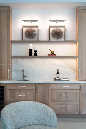 a living room with a bed and furniture