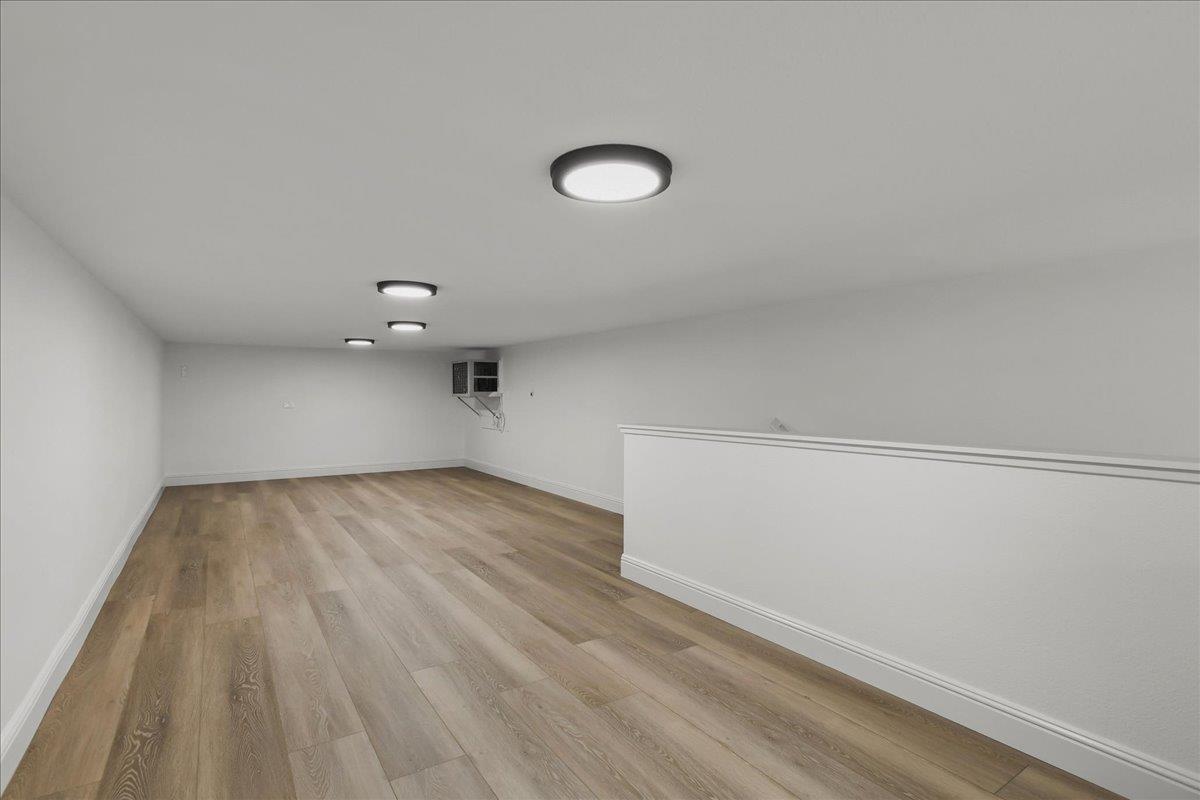 18911 Decatur Road Los Gatos, CA 95030 - Photo 103 of 143 a view of a room with wooden floor and fan