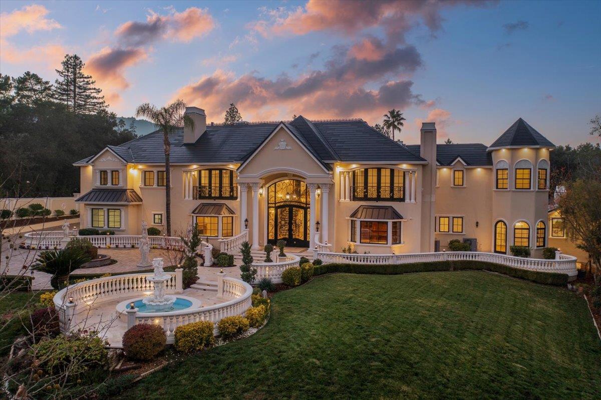 18911 Decatur Road Los Gatos, CA 95030 - Photo 11 of 143 a front view of a house with a garden and lake view