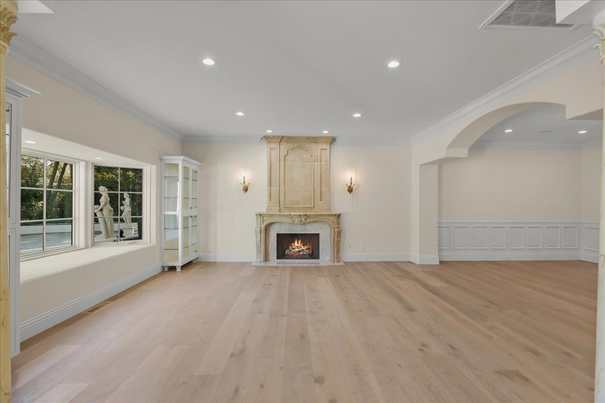 18911 Decatur Road Los Gatos, CA 95030 - Photo 26 of 143 a view of a livingroom with a fireplace cabinet and windows