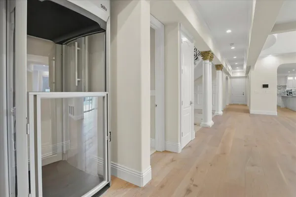 a view of an empty room with a fireplace