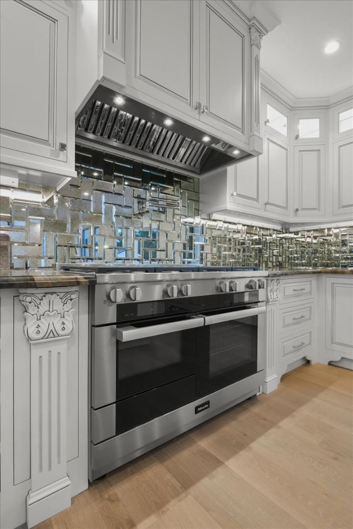 18911 Decatur Road Los Gatos, CA 95030 - Photo 45 of 143 a kitchen with stainless steel appliances granite countertop a stove and a granite counter tops