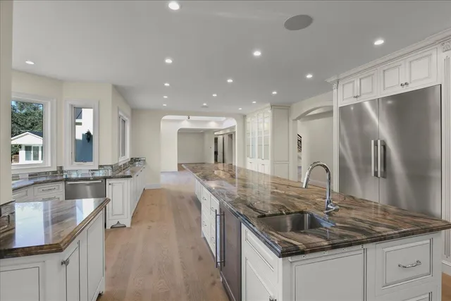 a view of an chairs and fire pit in the balcony