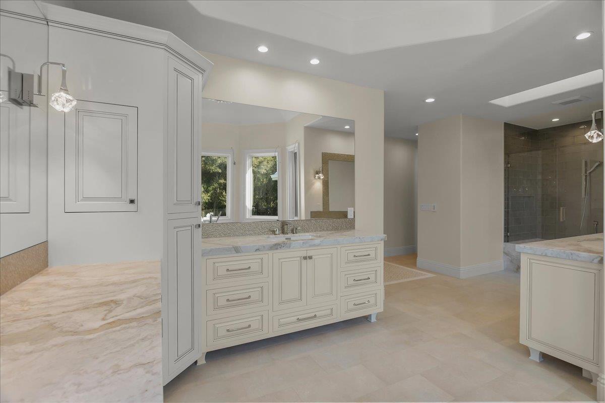 18911 Decatur Road Los Gatos, CA 95030 - Photo 63 of 143 a spacious bathroom with a granite countertop sink a mirror and a shower