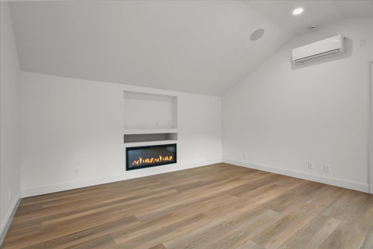 18911 Decatur Road Los Gatos, CA 95030 - Photo 90 of 143 a view of an empty room with a fireplace