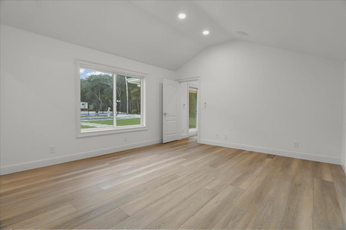 18911 Decatur Road Los Gatos, CA 95030 - Photo 93 of 143 a view of an empty room with wooden floor and a window