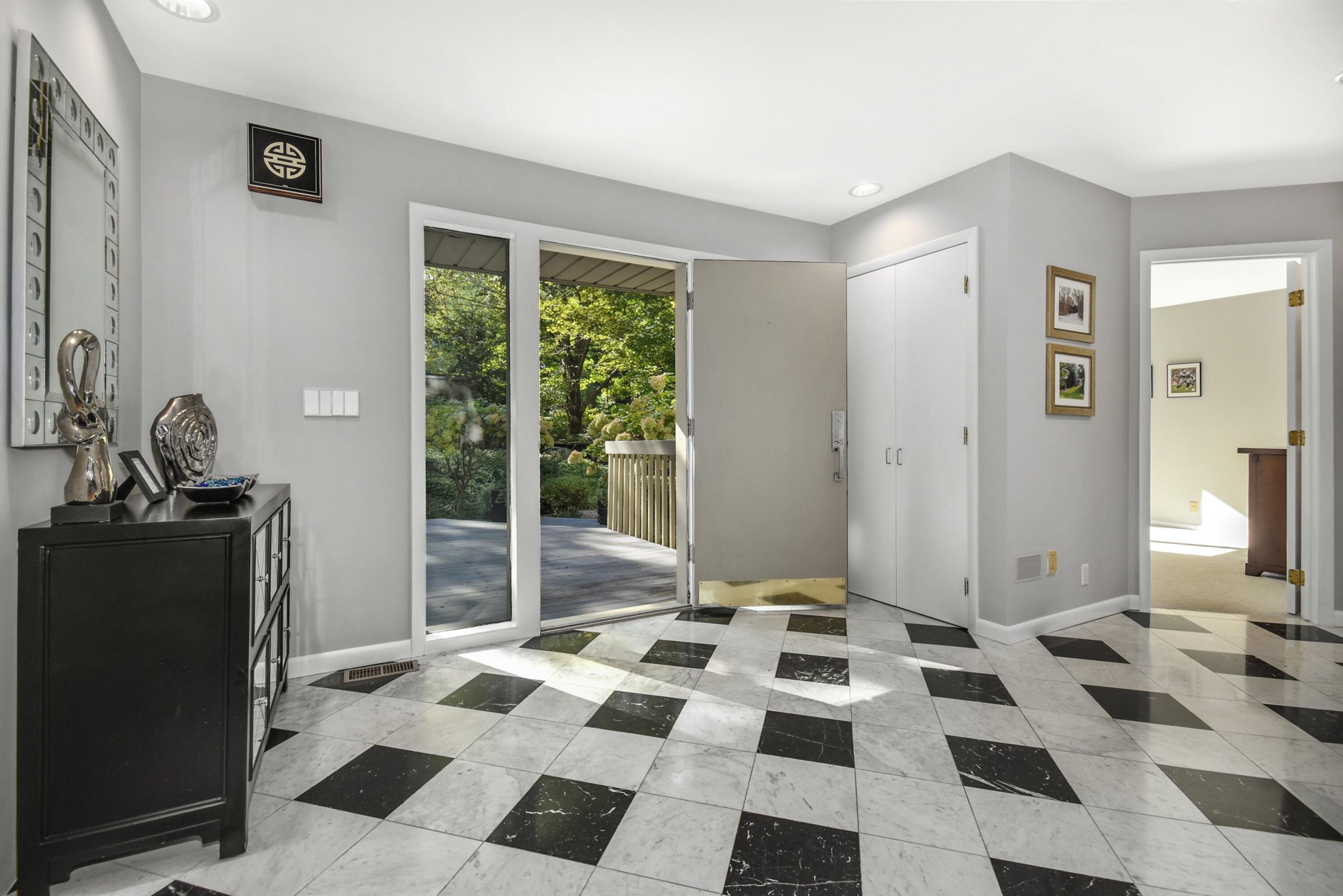 13 Echo Hill Road New Canaan, CT 06840 - Photo 3 of 37 a bedroom with a bed and a window