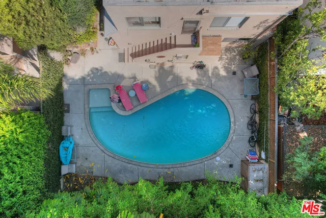 an aerial view of a backyard