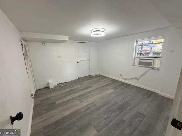 an empty room with windows