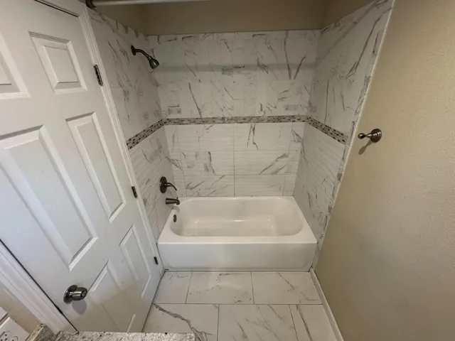 a bathroom with a bathtub