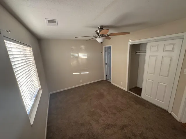 a view of a room with a window