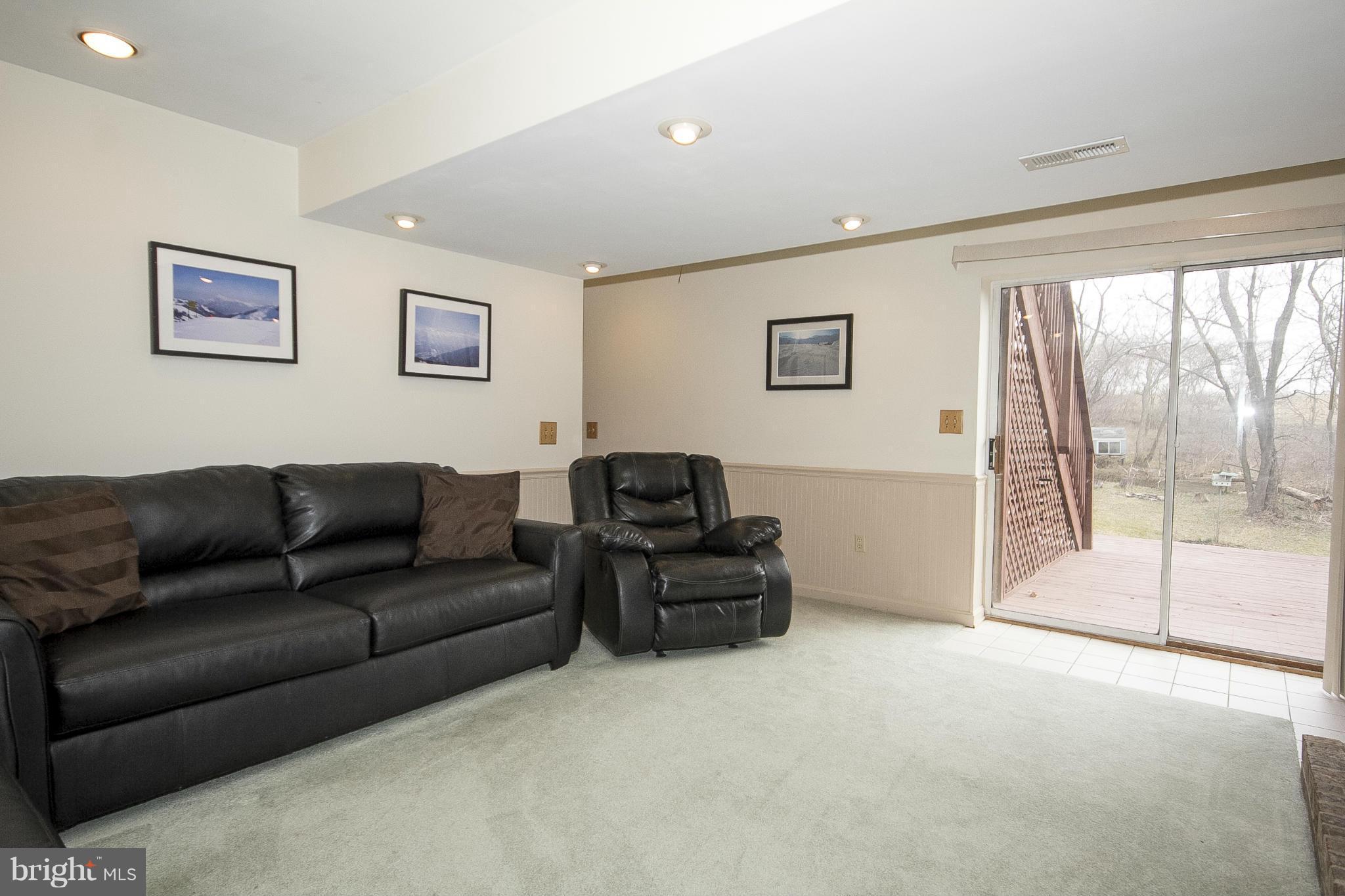 4540 Ridge Road Baltimore, MD 21236 - Photo 22 of 30 Rec Room w/Chair Rail