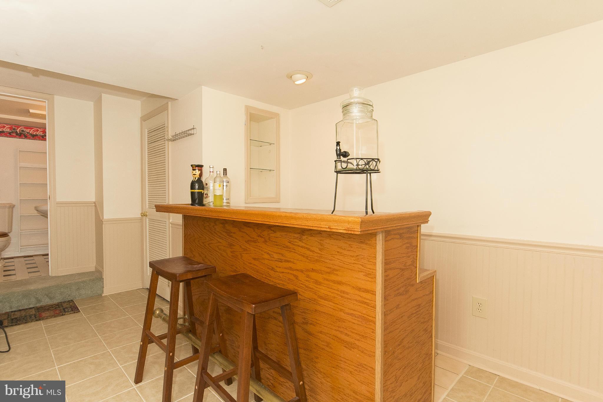 4540 Ridge Road Baltimore, MD 21236 - Photo 25 of 30 Lower Level Wet Bar Area w/Ceramic Tile