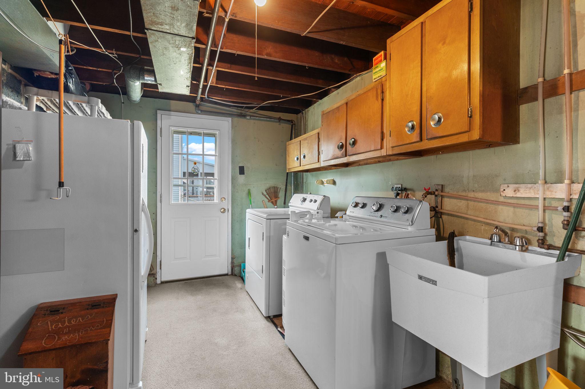 1001 Birch Road Warminster, PA 18974 - Photo 17 of 29 a view of a storage & utility room with dryer and washer