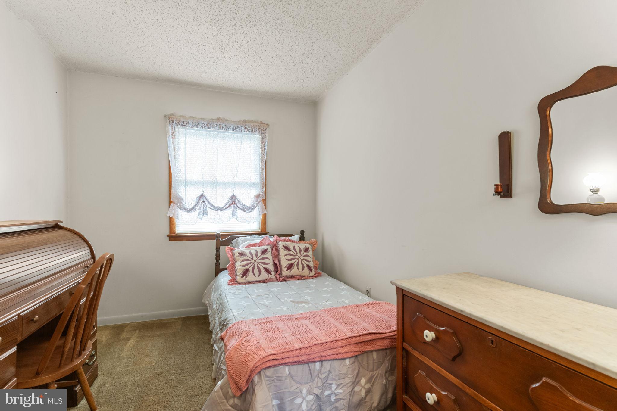 1001 Birch Road Warminster, PA 18974 - Photo 21 of 29 a bedroom with a bed and a dresser
