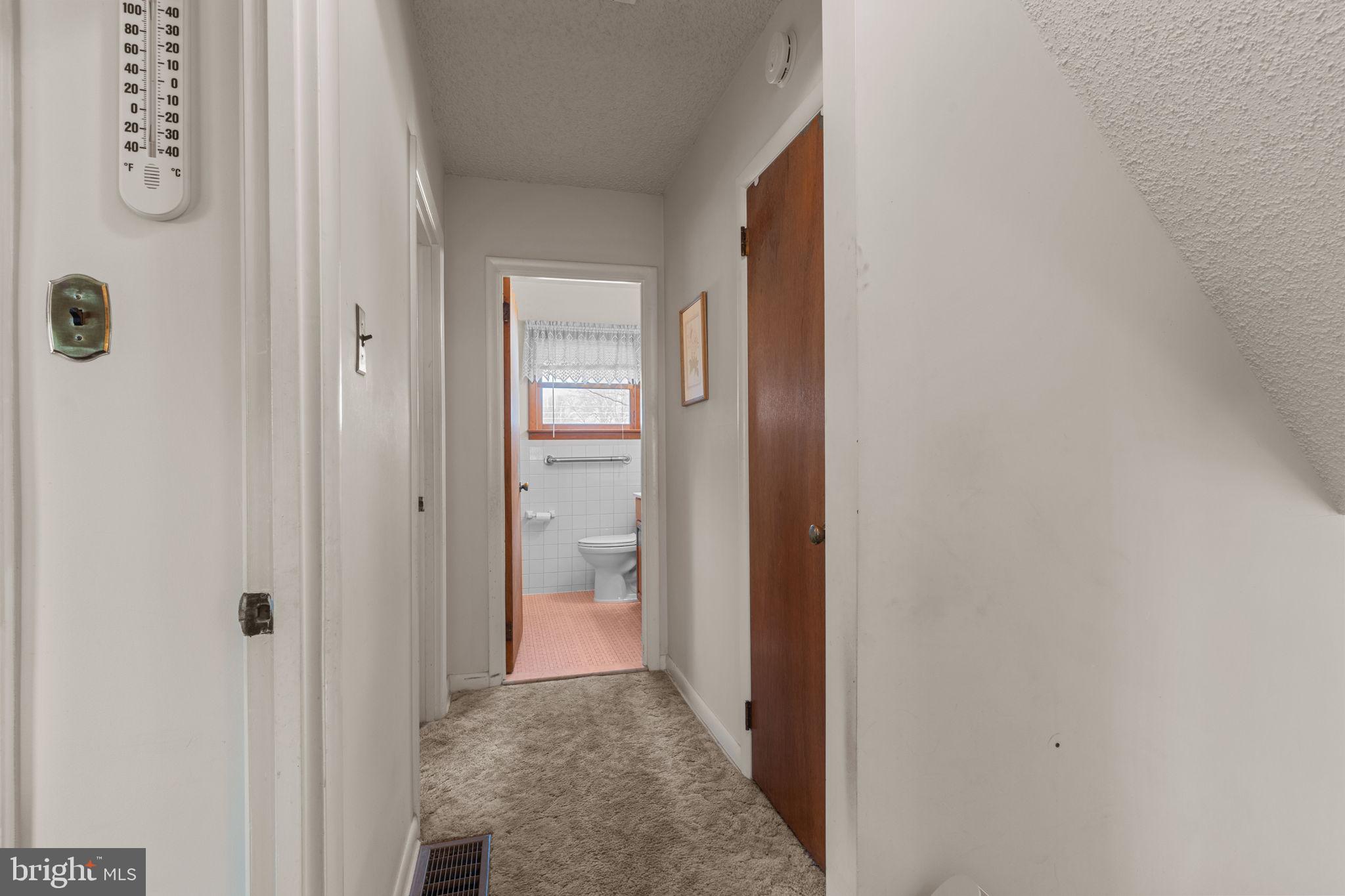 1001 Birch Road Warminster, PA 18974 - Photo 24 of 29 a view of a bathroom from a hallway