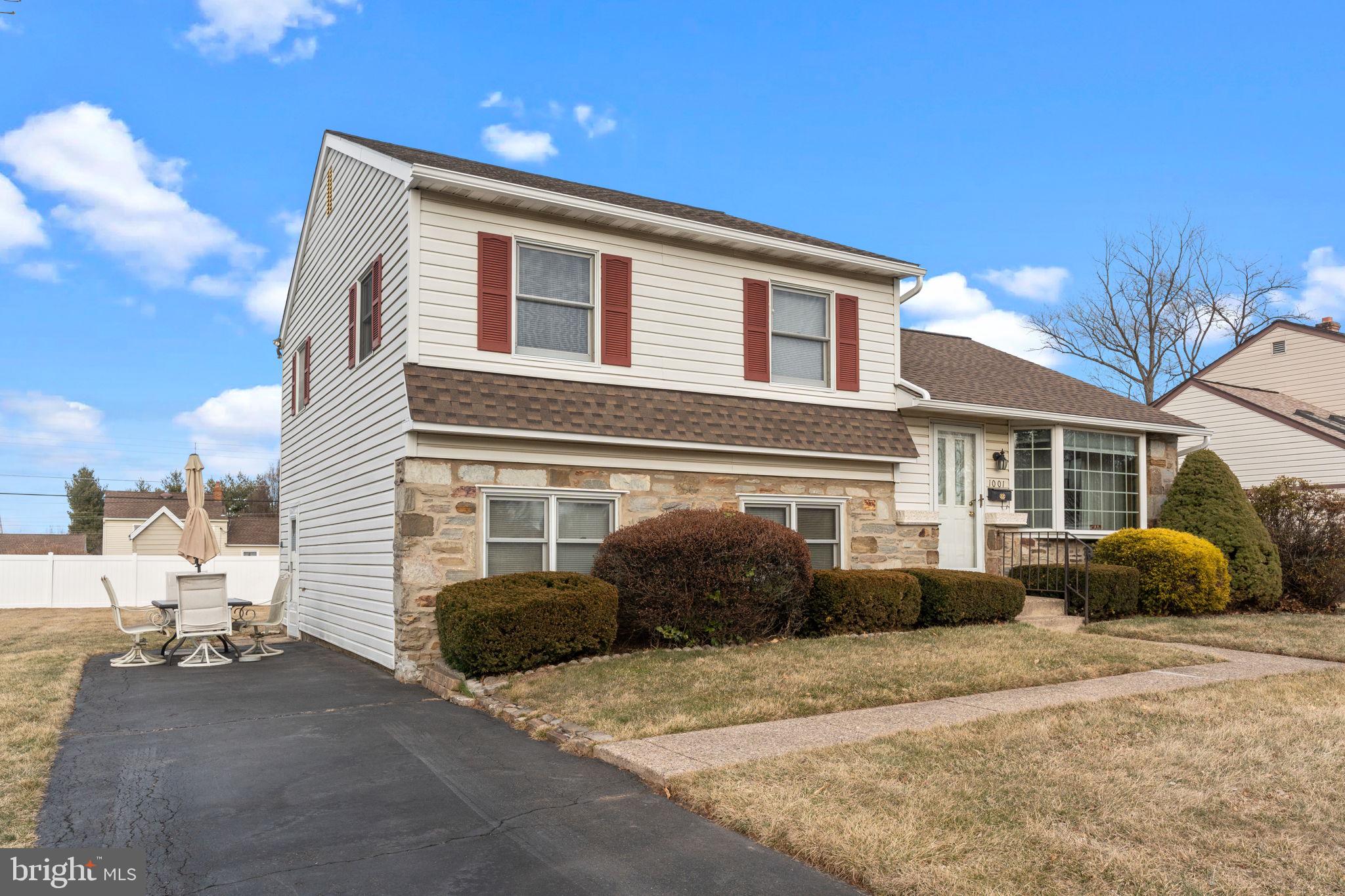 1001 Birch Road Warminster, PA 18974 - Photo 28 of 29 a front view of a house with a yard and outdoor seating