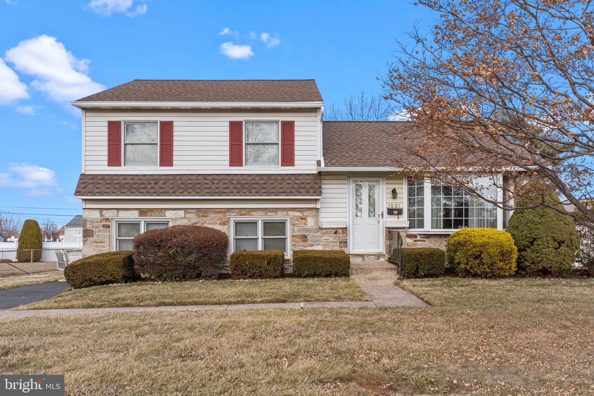 1001 Birch Road Warminster, PA 18974 - Photo 3 of 29 a front view of a house with a garden