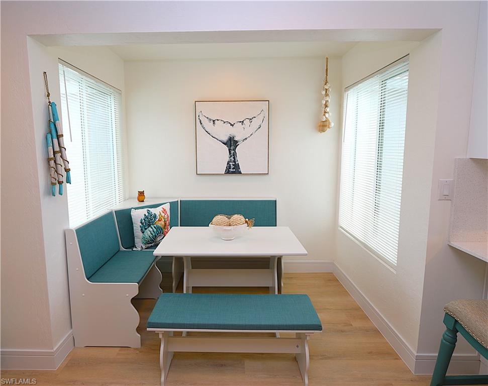2235 San Marco Road, Unit 5204 Marco Island, FL 34145 - Photo 16 of 42 Dining space with breakfast area and light wood-style flooring