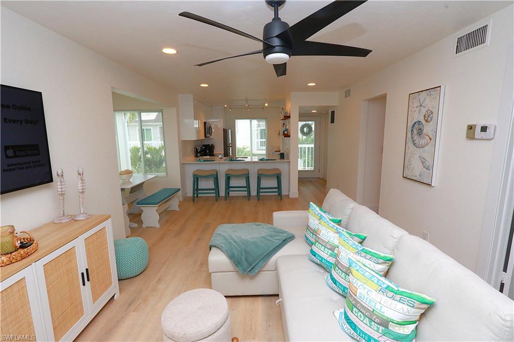 2235 San Marco Road, Unit 5204 Marco Island, FL 34145 - Photo 9 of 42 Living area with light wood-style floors, recessed lighting, and ceiling fan