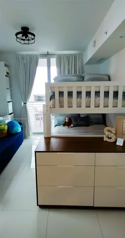 a bathroom with a mirror and a shower
