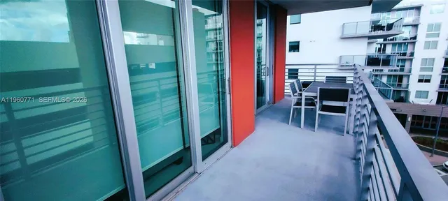 a view of a building from a balcony