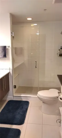 a kitchen with a sink stainless steel appliances and cabinets