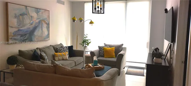 a view of a small space with wooden floor