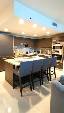 a picture of a bathroom with a shower