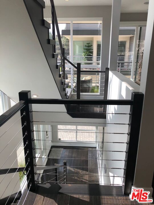 12003 Emery Lane Valley Village, CA 91607 - Photo 10 of 22 a view of entryway and hall with wooden floor