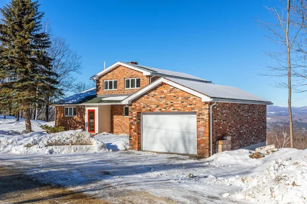 $750,000 | 57 Pearl Buck Drive, Unit 33, Winhall, VT 05340