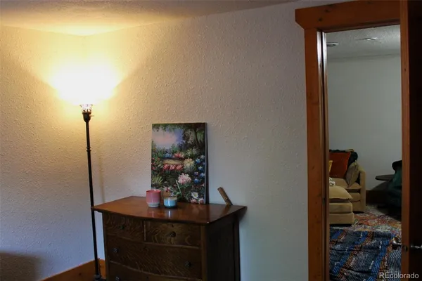a room with a table and chairs