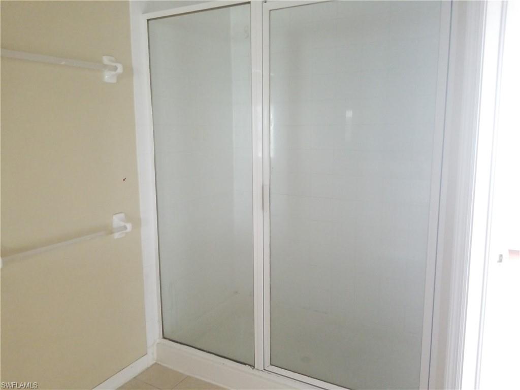 988 Hampton Circle, Unit 73 Naples, FL 34105 - Photo 20 of 22 a view of a closet