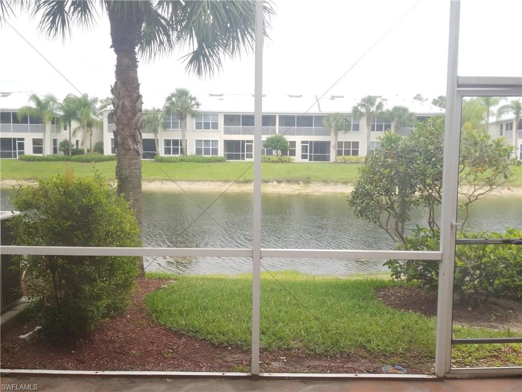 988 Hampton Circle, Unit 73 Naples, FL 34105 - Photo 2 of 22 a view of a garden from a balcony