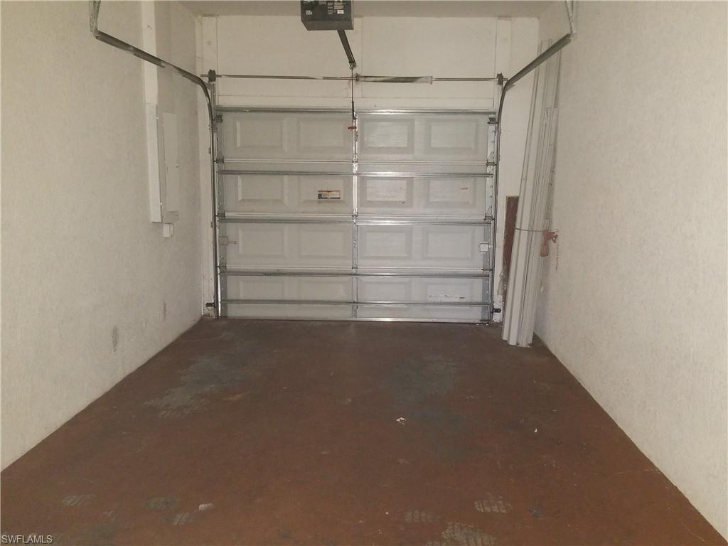988 Hampton Circle, Unit 73 Naples, FL 34105 - Photo 22 of 22 a empty closet with white paint