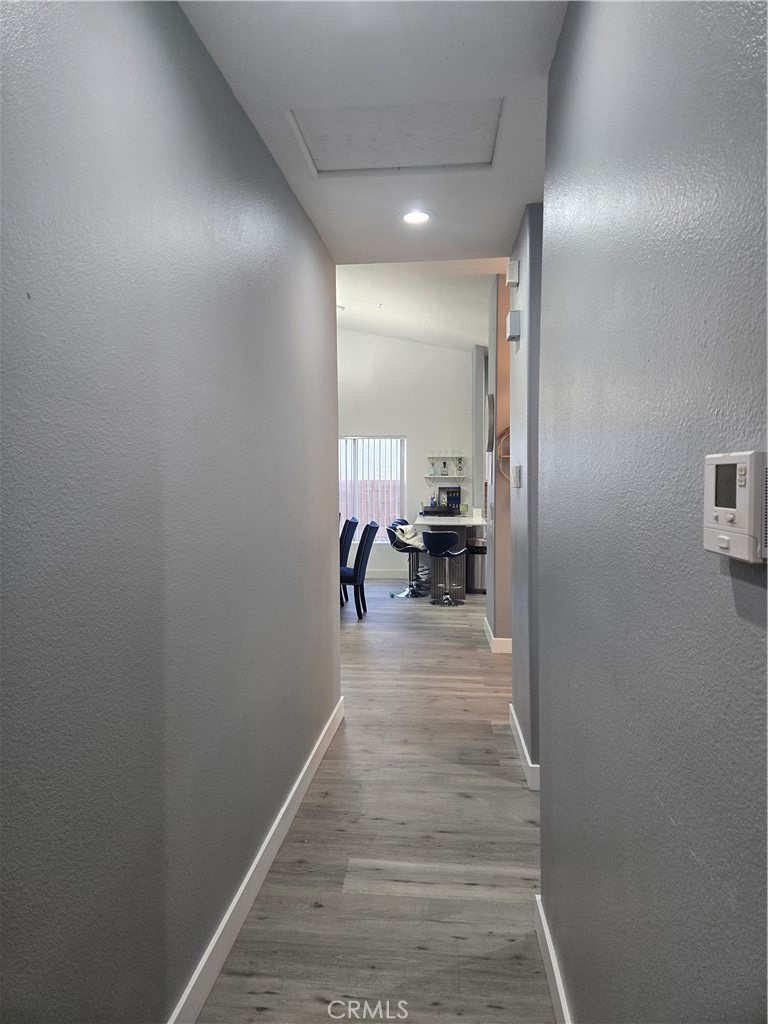 33860 Bell Thousand Palms, CA 92276 - Photo 14 of 49 a view of a hallway with a livingroom and furniture