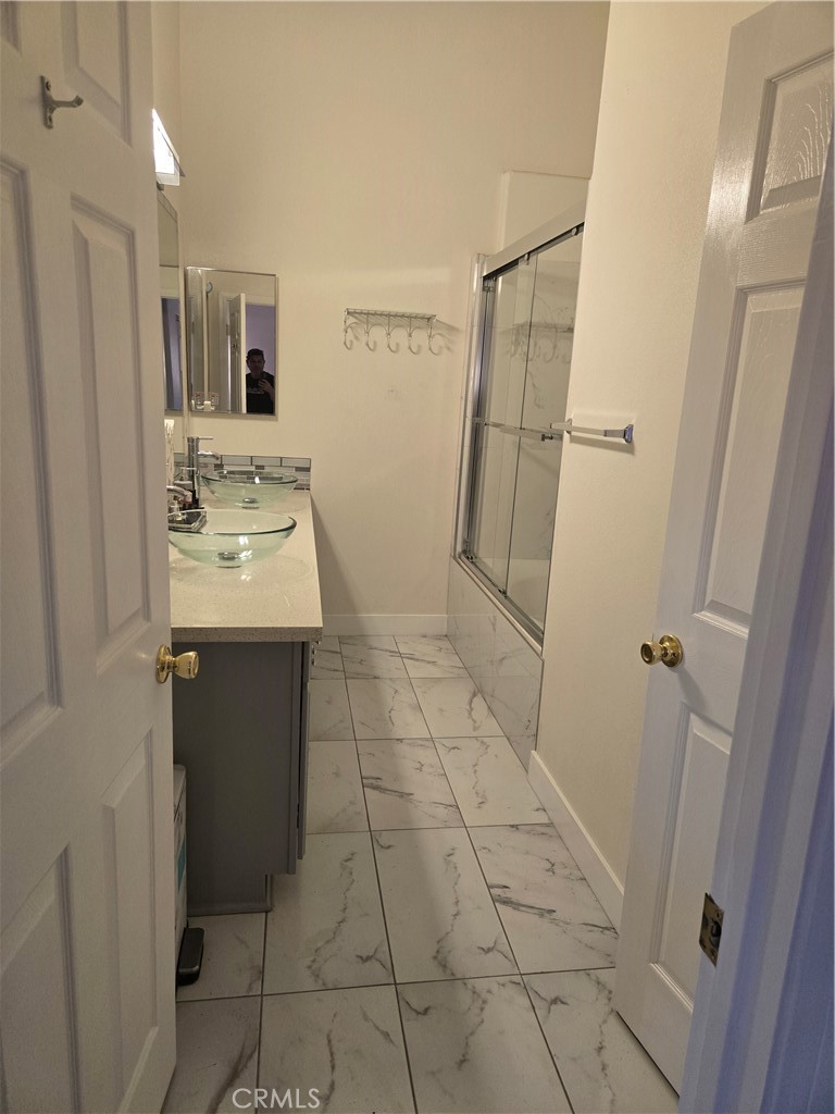 33860 Bell Thousand Palms, CA 92276 - Photo 17 of 49 a bathroom with a sink toilet and shower