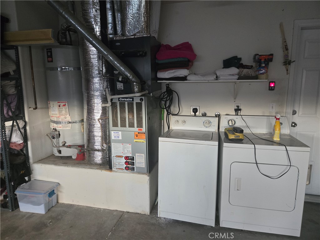 33860 Bell Thousand Palms, CA 92276 - Photo 30 of 49 a utility room with dryer and washer