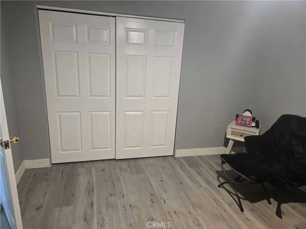 33860 Bell Thousand Palms, CA 92276 - Photo 32 of 49 a view of room with wooden floor