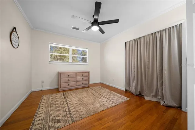 a view of a room with a flat screen tv