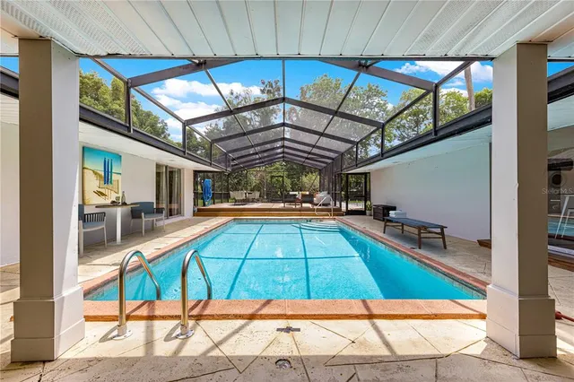 a room with lots of tables and chairs