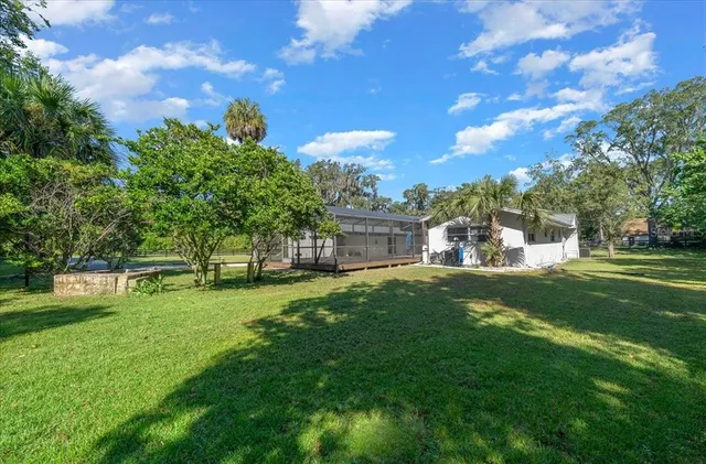 a view of a house with a big yard