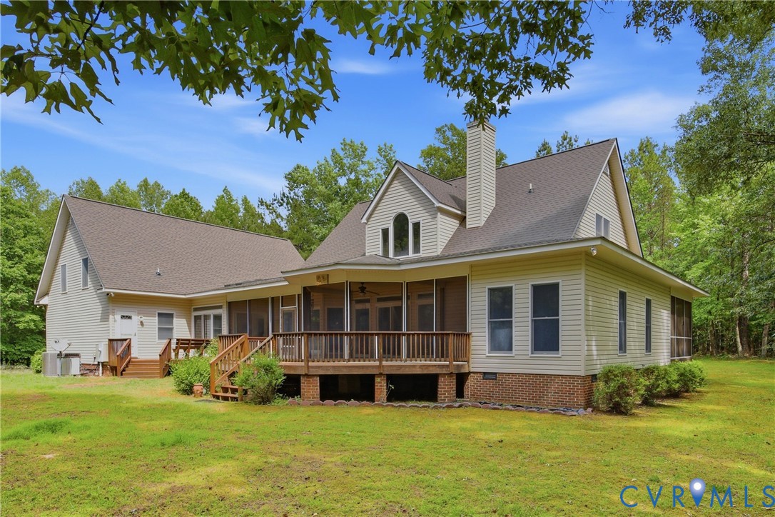 13265 Coulbourn Road Saluda, VA 23149 - Photo 50 of 62 Beige siding exterior with a brown shingle roof, f