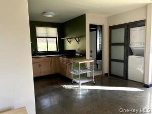 123 B Sharon Road, Unit B Millerton, NY 12546 - Photo 3 of 5 View of open concept for laundry closet, bathroom, and kitchen