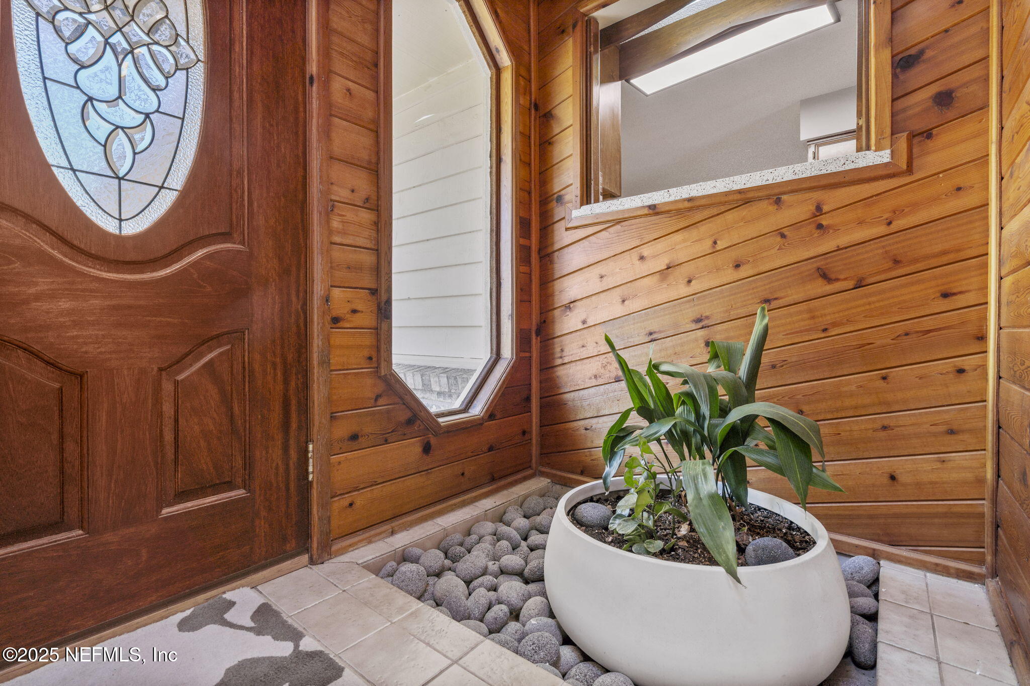 2587 Bayou Ridge Court Orange Park, FL 32065 - Photo 16 of 40 a vase of flowers sitting on a table