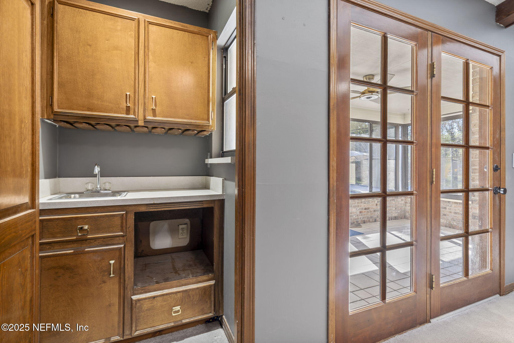2587 Bayou Ridge Court Orange Park, FL 32065 - Photo 18 of 40 a bathroom with a sink and a window
