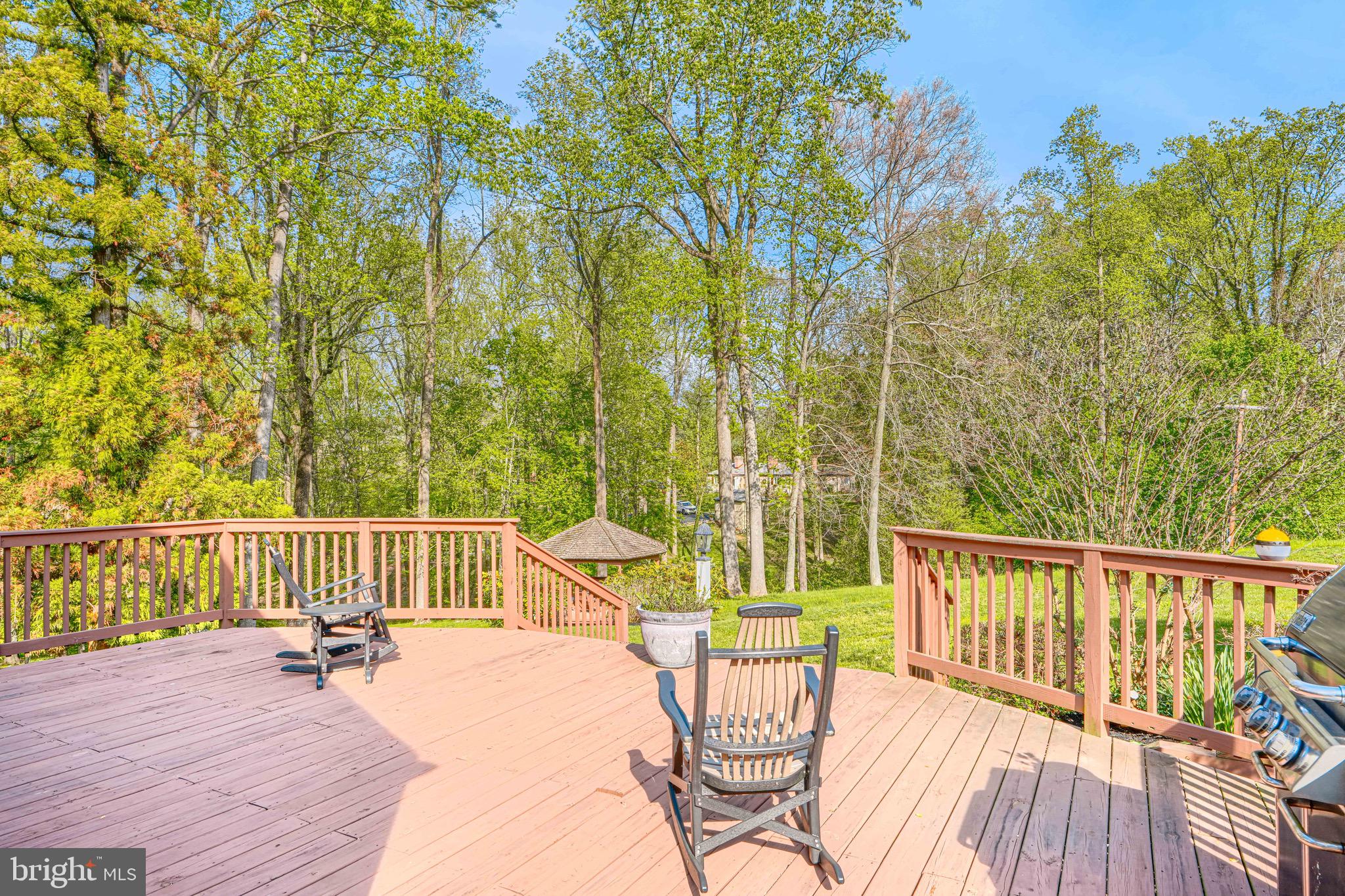 227 Greenspring Valley Road Owings Mills, MD 21117 - Photo 78 of 85 a view of a balcony with wooden floor and outdoor seating