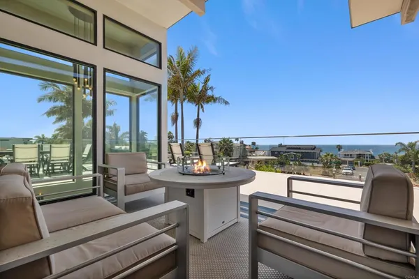 a view of a patio with swimming pool