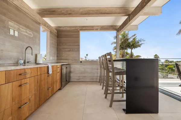 a kitchen with stainless steel appliances a refrigerator and a sink