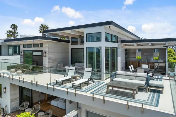 a front view of house with yard outdoor seating and barbeque oven